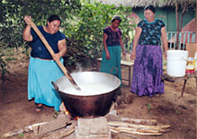 Ladies cooking traditional Day of the Dead meals
